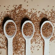 pexels-vie-studio-7420868 Three spoons full of flaxseed, an ingredient often included in horse diets