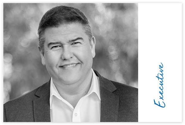 About-Us-cards_Shaun_2024 Black and white photo of Shaun Mitchell, FeedXL COO.